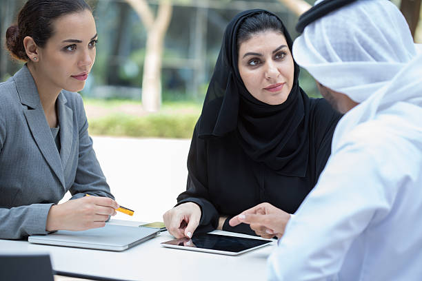 Business meeting at RAKEZ Free Zone with professionals discussing strategy and operations.