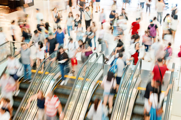 A bustling mall filled with holiday shoppers, emphasizing the need for effective business strategies.